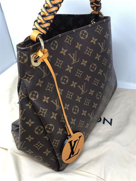 louis vuitton purse with top fur black handle|Louis Vuitton handles replacement.